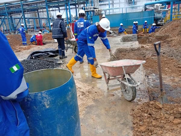 Industrial construction workers on site